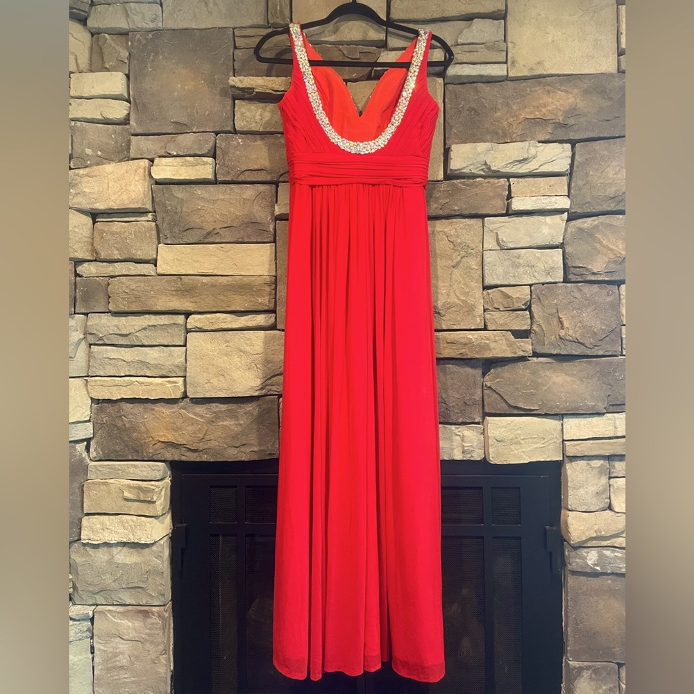 Red dress JVN by Jovani dress with sequins along the neckline and straps.